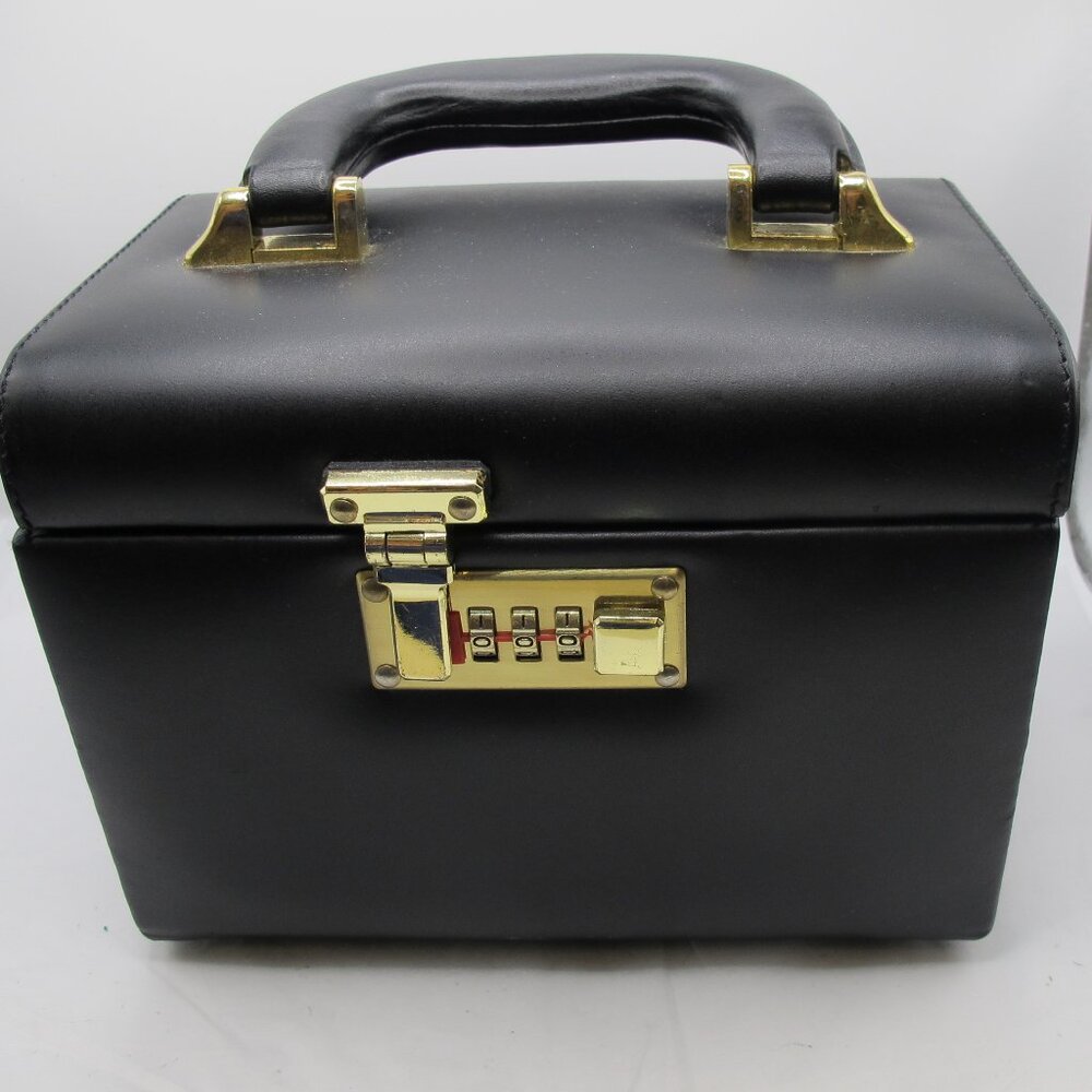 Leather black locking jewelry case with ring form and 2 additional drawers